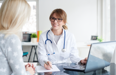 woman talking to her physician