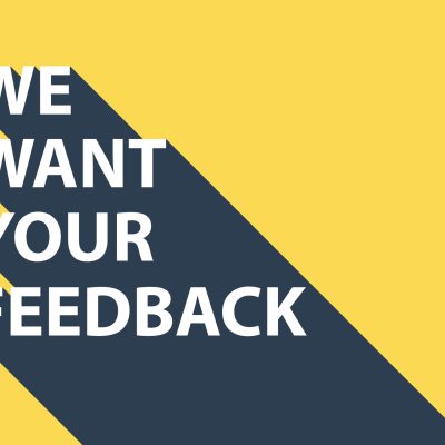 Business concept with text We Want Your Feedback and long shadow.