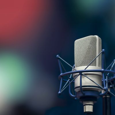 Background with a professional microphone and copy space