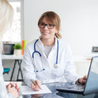 woman talking to her physician